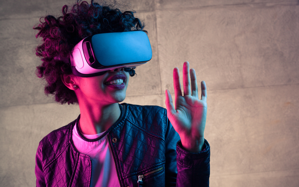 a woman wearing a vr headset and showing the palm